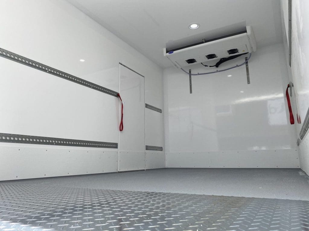 Inside of Eurocold refrigerated truck with side door and Carrier fridge