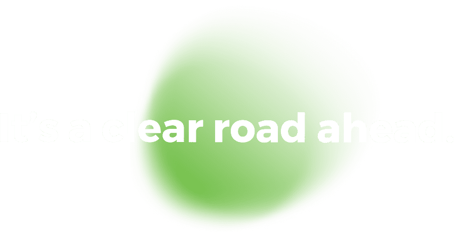 White text reading clear road ahead is partially visible over a large, irregular green circle on a white background. The left side of the text is cut off.
